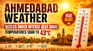 "Sunny and clear sky over Ahmedabad city skyline with bright sunshine and no clouds, temperature 34°C."
